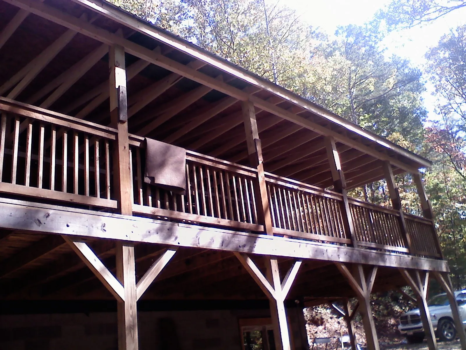 Timber framing under a new elevated porch and deck — Roof Leak Repair in Sweet Springs by Roofing Brothers